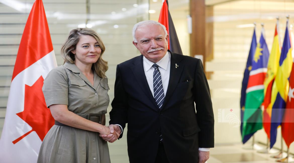  المالكي  خلال لقائه وزيرة الخارجية الكندية ميلاني جولي (عدسة: محمد أبو زيد/ وفا)